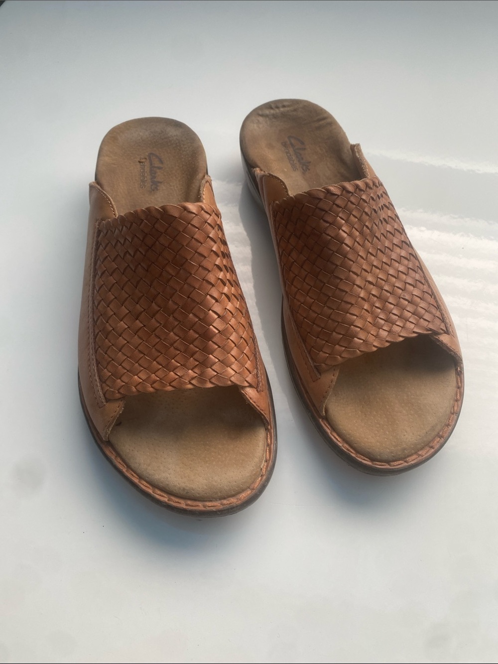 Clarks Woman’s Tan Woven Leather Slide Sandals